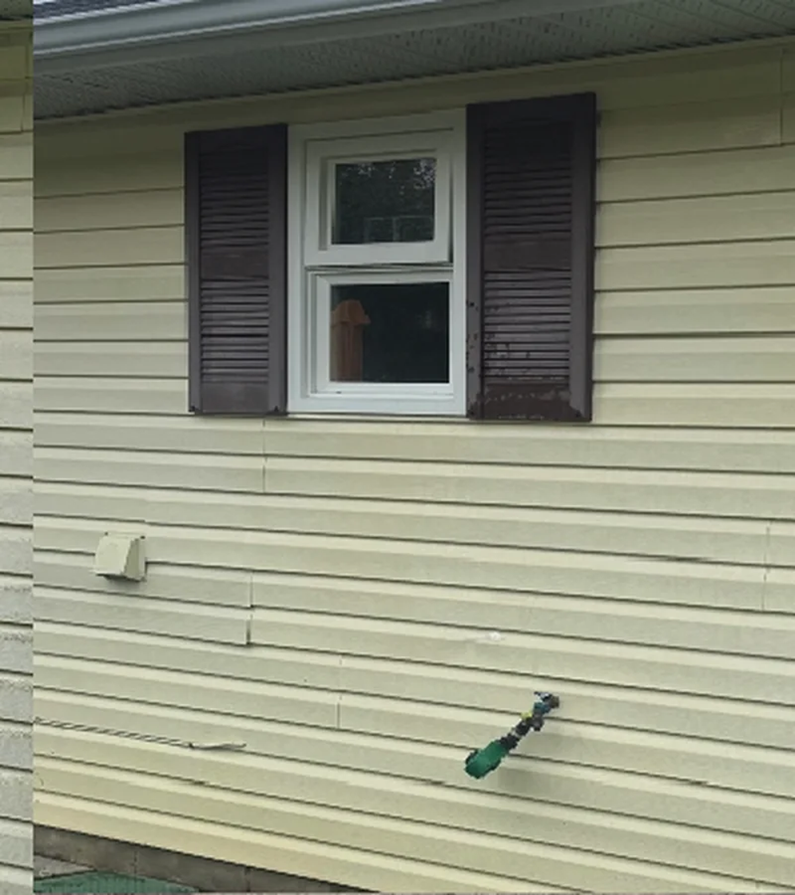 Freshly washed house siding by Mr. Sparkle